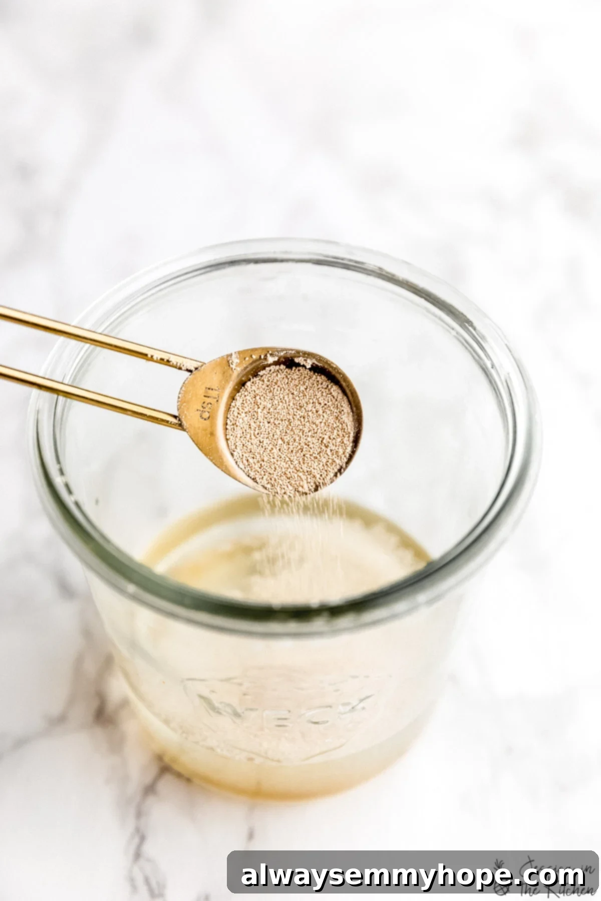 How to Test Yeast for Viability 3 Yeast being poured into warm water to test it.