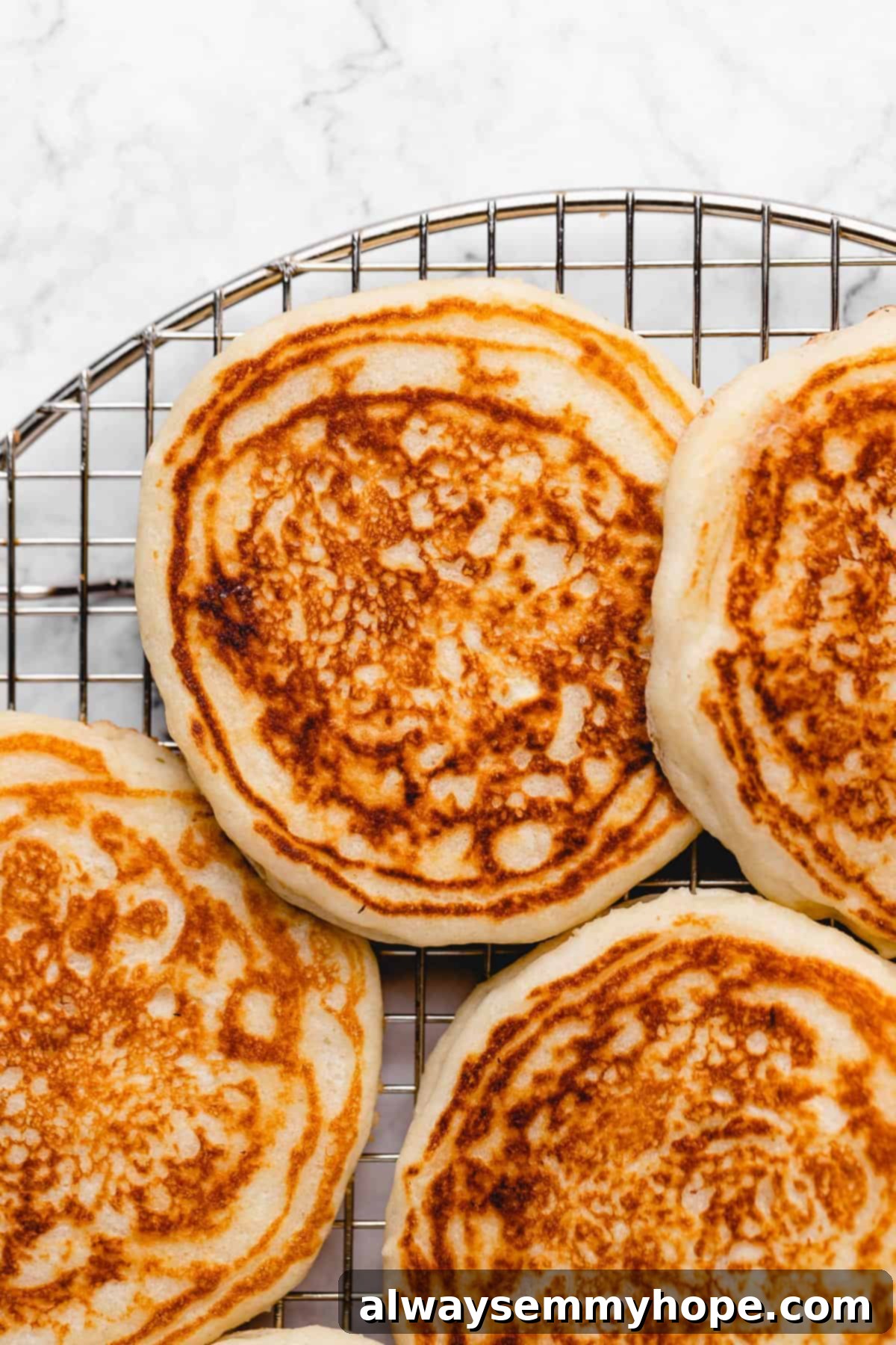 Cooling rack of crispy vegan pancakes.