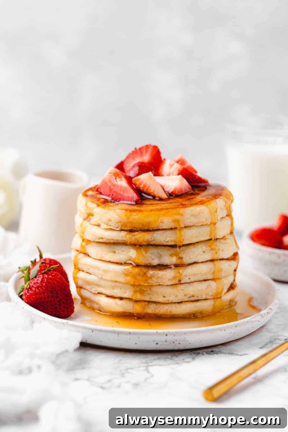 Vegan pancakes and chopped strawberries.