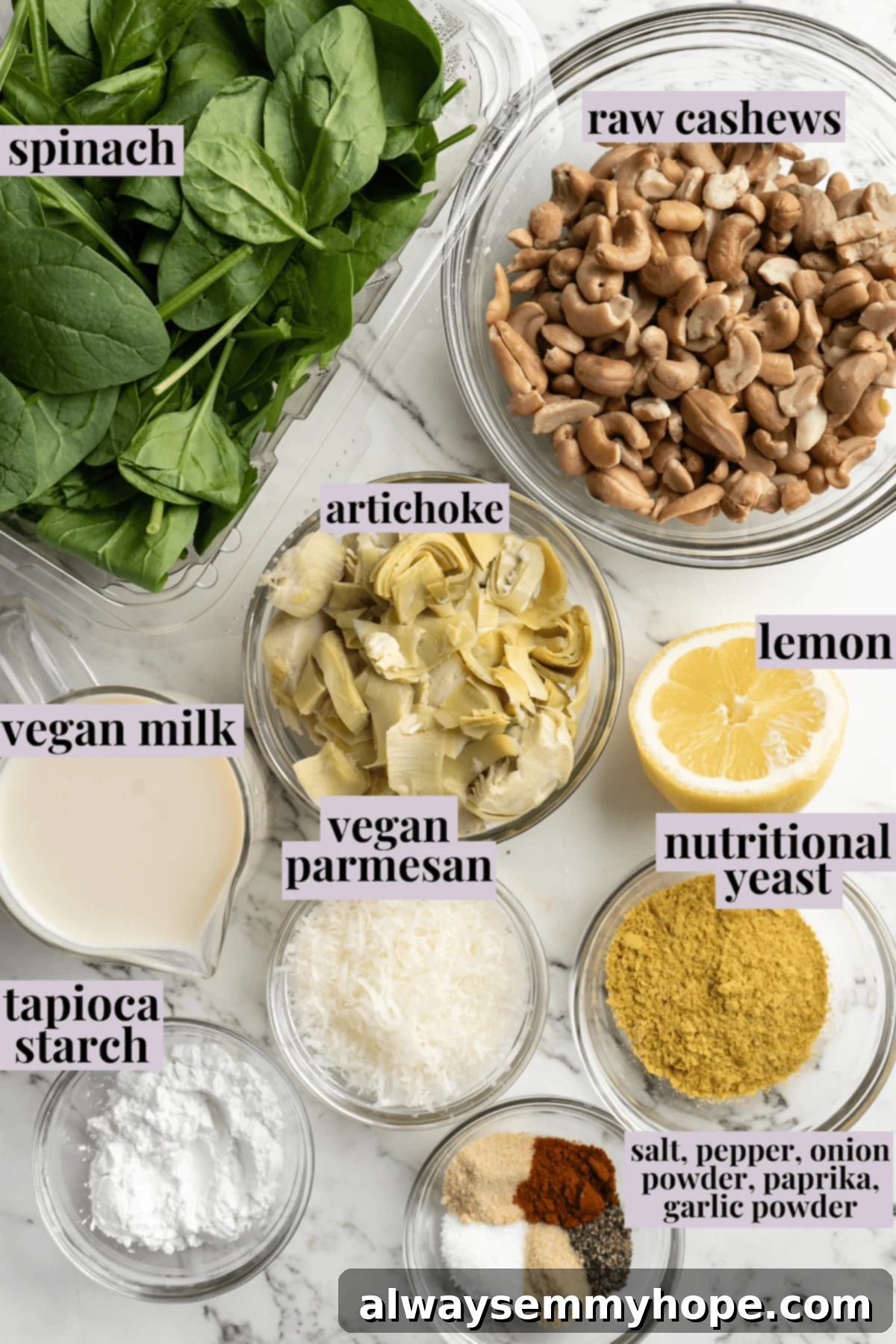 All the fresh ingredients you need for a truly delicious vegan spinach artichoke dip. Overhead flat lay of all the essential ingredients for vegan spinach artichoke dip, meticulously laid out on a kitchen surface, with clear labels for easy identification.
