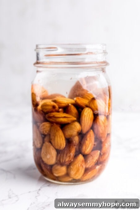 Homemade Almond Milk: The Ultimate Guide to Creamy, Easy, and Customizable Plant-Based Milk Almonds soaking in jar