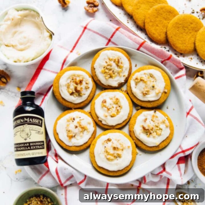Rolled Pumpkin Spice Cookies decorated with white icing.