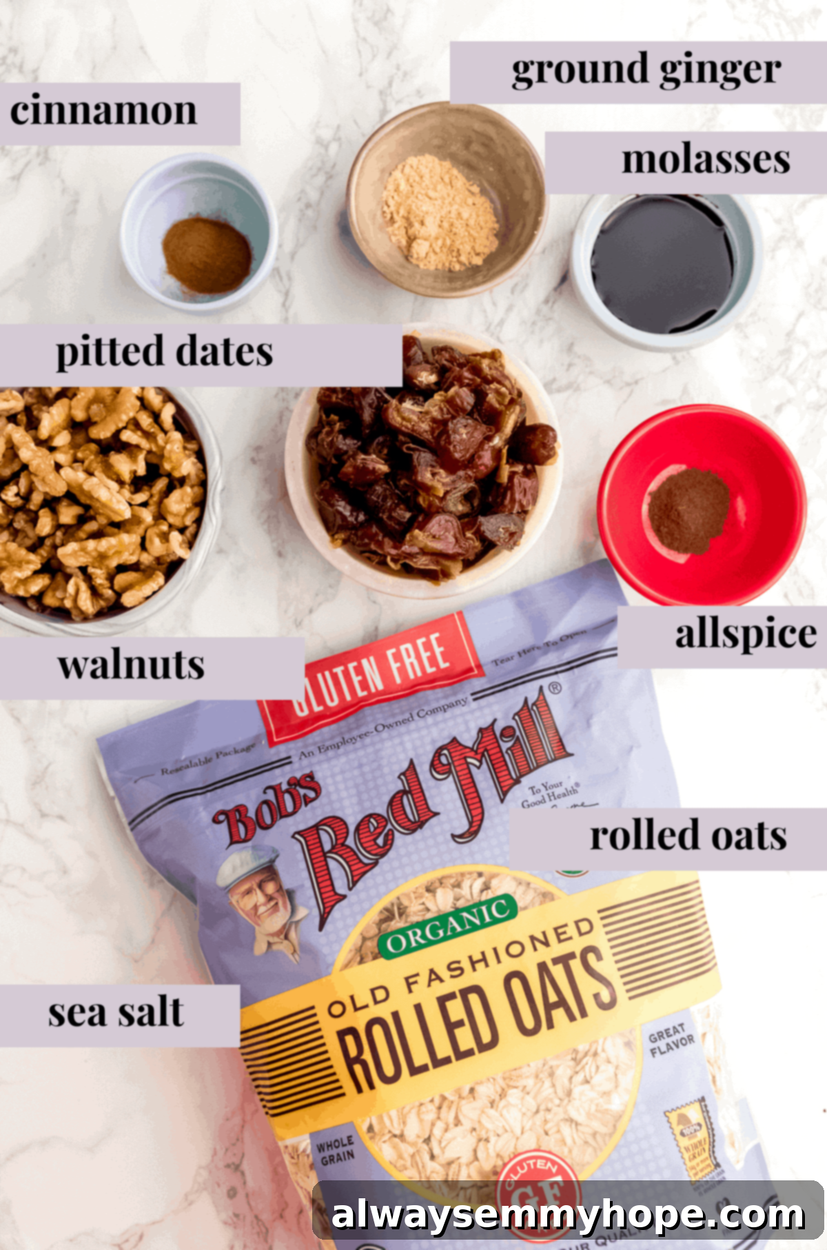 Festive Gingerbread Energy Bites 3 A vibrant flat lay of all the essential ingredients laid out for making gingerbread energy bites, including nuts, dates, oats, molasses, and spices, ready for blending.