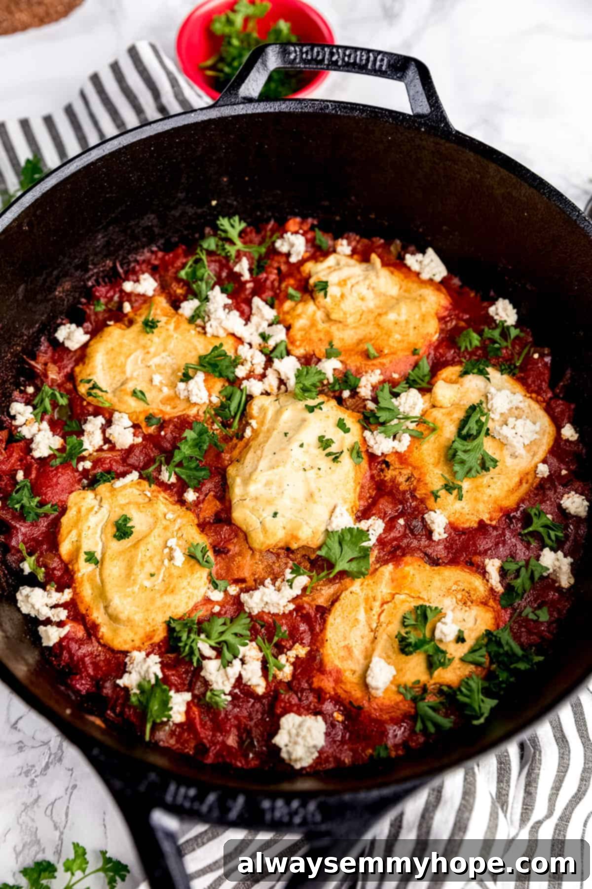 Wholesome Vegan Shakshuka 3 Close-up of the elegant Blacklock 4 Quart Deep Skillet from Lodge Cast Iron, showcasing its deep design and smooth, pre-seasoned finish, ideal for cooking large, flavorful dishes like vegan shakshuka.