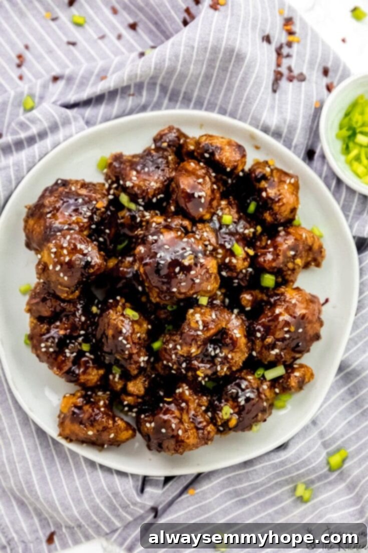 Vegan General Tso cauliflower wings with a sweet and spicy glaze, a homemade takeout favorite.