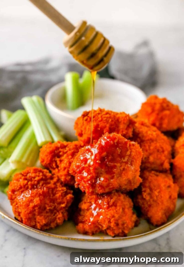 Classic Buffalo cauliflower wings with a spicy kick, a perfect vegan game day appetizer.