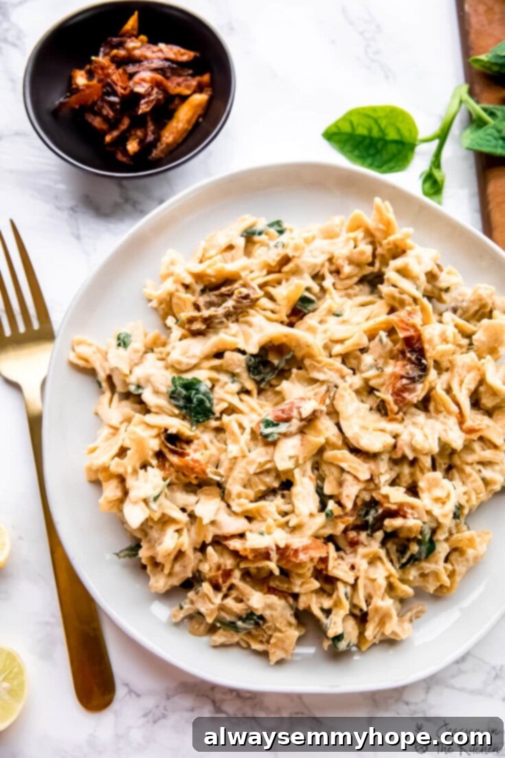 Hummus Pasta, a creamy and customizable vegan dish ready in 20 minutes.