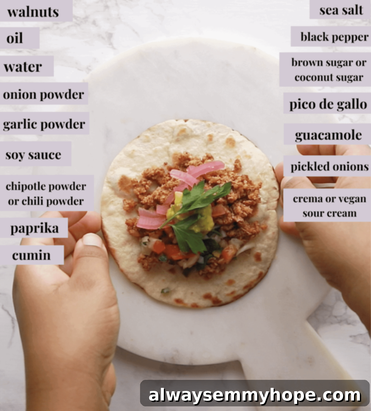 Irresistible Vegan Tacos 14 A beautifully assembled vegan taco featuring walnut meat, guacamole, and pickled onions on a rustic cutting board.