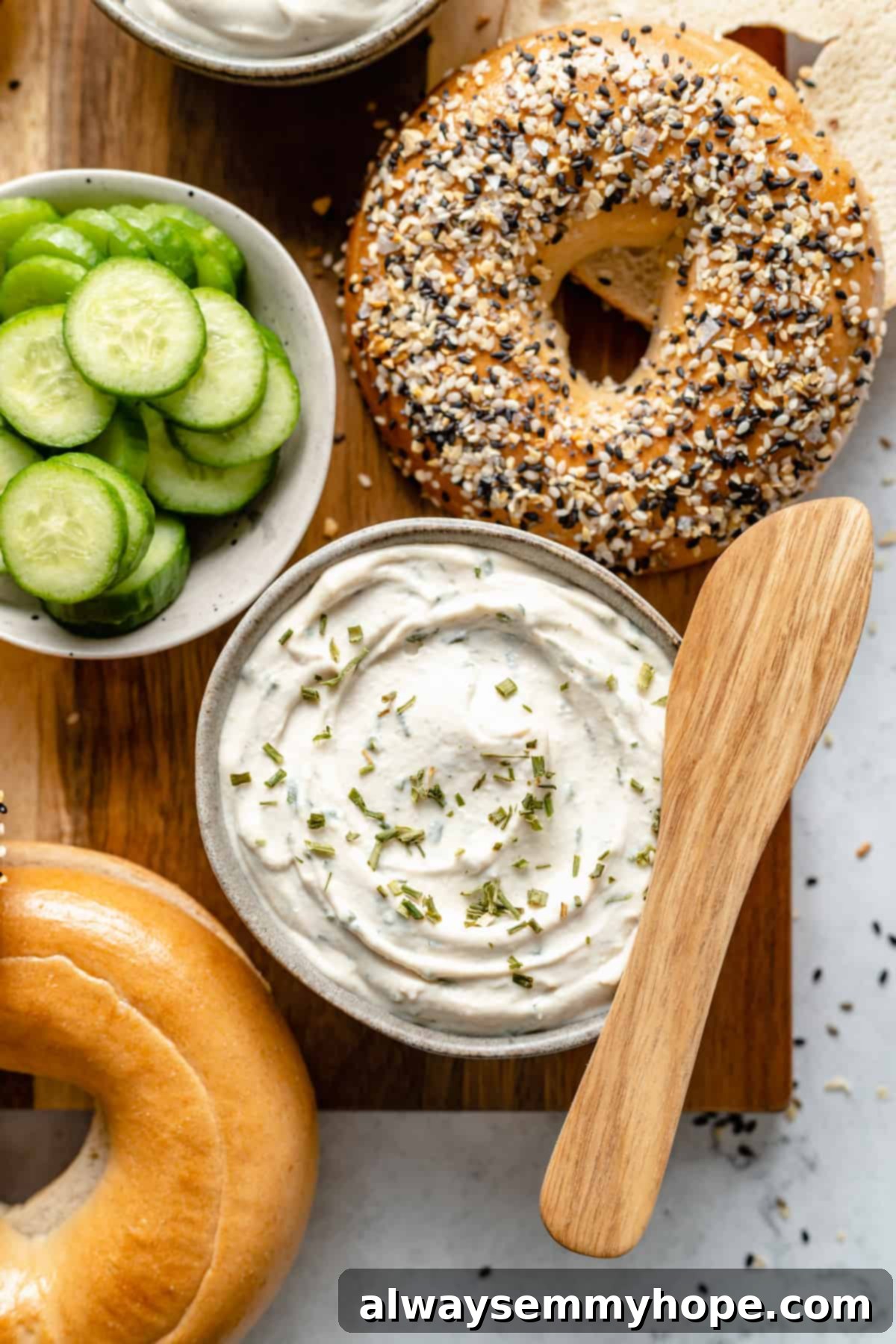 Homemade vegan cream cheese seasoned with fresh chives and garlic, showcasing a savory variation.