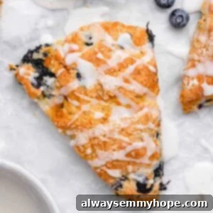 Fluffy Vegan Scones 17 Birds eye view close-up of a glaze drizzled vegan scone