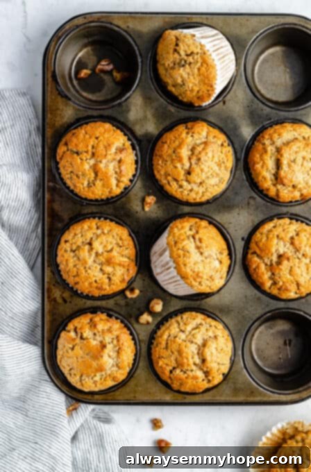 Garden-Fresh Vegan Zucchini Muffins 14 Close-up of freshly baked muffins in a muffin pan.