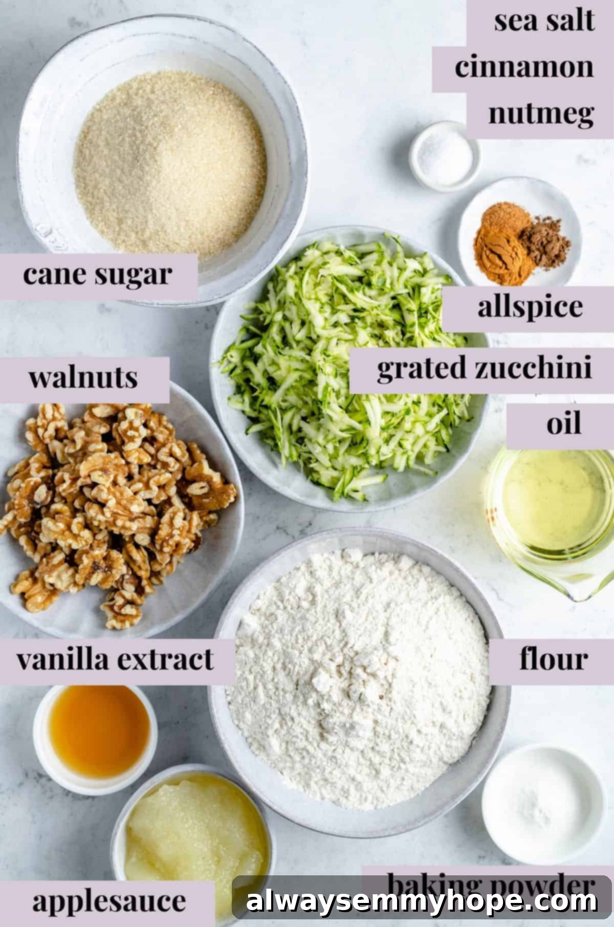 Garden-Fresh Vegan Zucchini Muffins 4 Various ingredients for healthy vegan zucchini muffins, including flour, sugar, zucchini, and applesauce, laid out on a table.