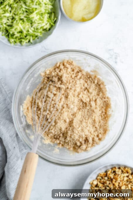 Zucchini bread batter in a mixing bowl.