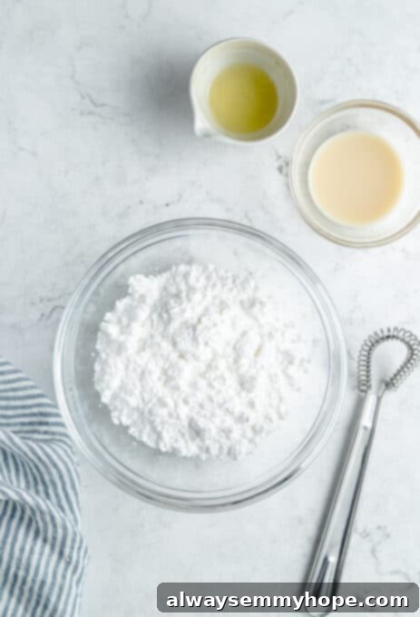 Powdered sugar in a mixing bowl, ready for glaze preparation.