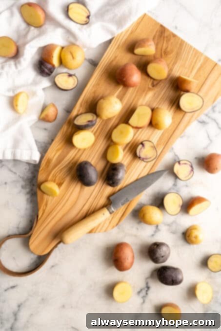 Slices of raw potatoes on a wooden cutting board next to a knife, ready for preparation. Potatoes are a staple vegetable that, in addition to being a good source of carbohydrates, also contribute a fair amount of plant-based protein and essential nutrients.