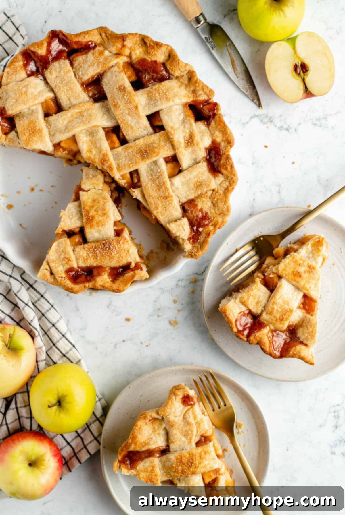 Perfect Vegan Apple Pie 5 Slices of baked vegan apple pie artfully arranged on a white platter.