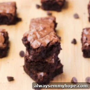 A stack of chewy fudge brownies, ready to be enjoyed.