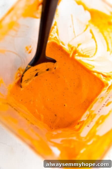 Blended red pepper pasta sauce inside the blender.