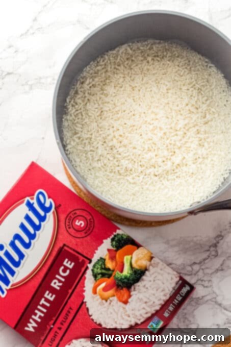 Korean Gochujang Tofu Rice Bowls 7 A bowl of fluffy, cooked Minute Rice next to its box packaging, highlighting the convenience of instant rice.