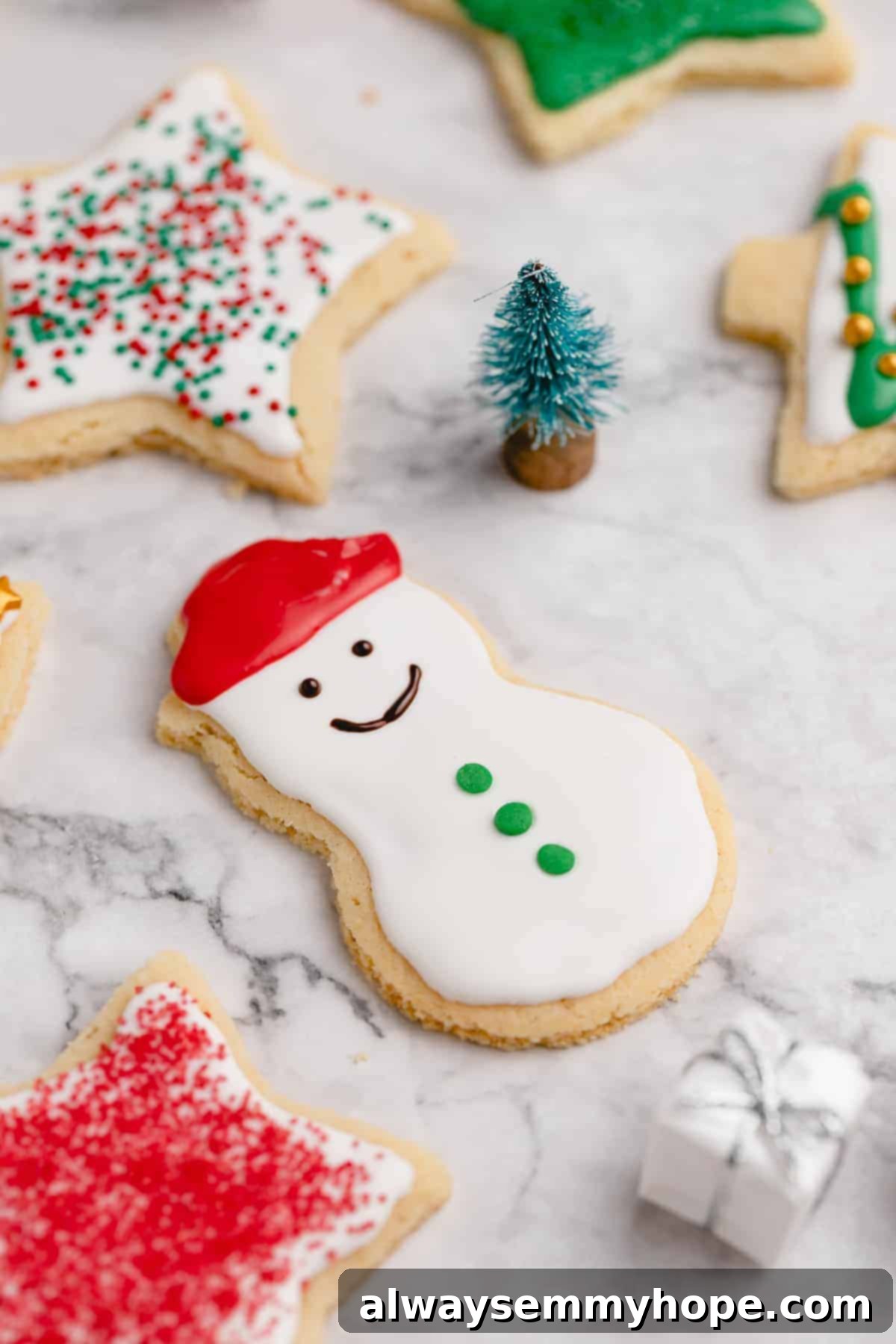 Closeup of decorated snowman sugar cookie