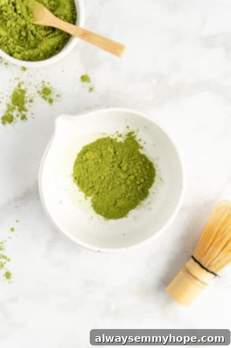 Smooth Iced Matcha Latte 6 Overhead view of bright green matcha powder carefully placed in a traditional matcha bowl.