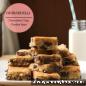 Decadent Ghirardelli Chocolate Chip Cookie Bars 2 A stack of cookie bars on a dish.