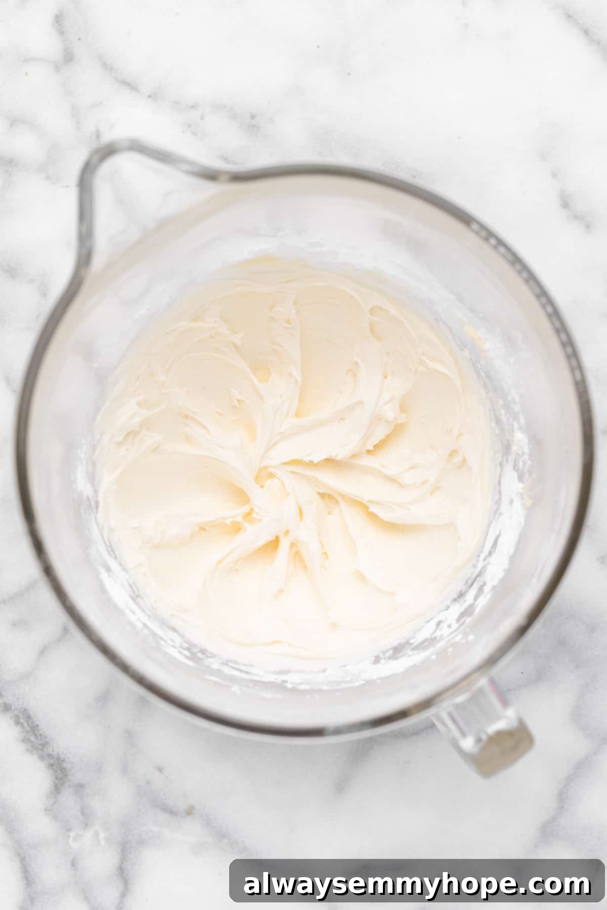 These vegan frosted sugar cookie bars have all the flavor of a classic sugar cookie, without the rolling and cutting, or the dairy and eggs! Frosting in mixing bowl before adding colouring