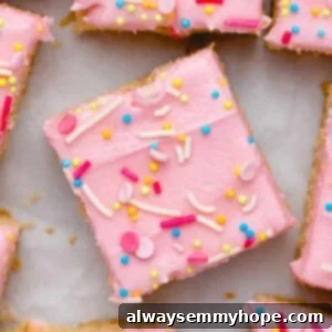 Delicious Vegan Sugar Cookie Bars 2 Overhead view of sugar cookie bars topped with pink frosting and sprinkles