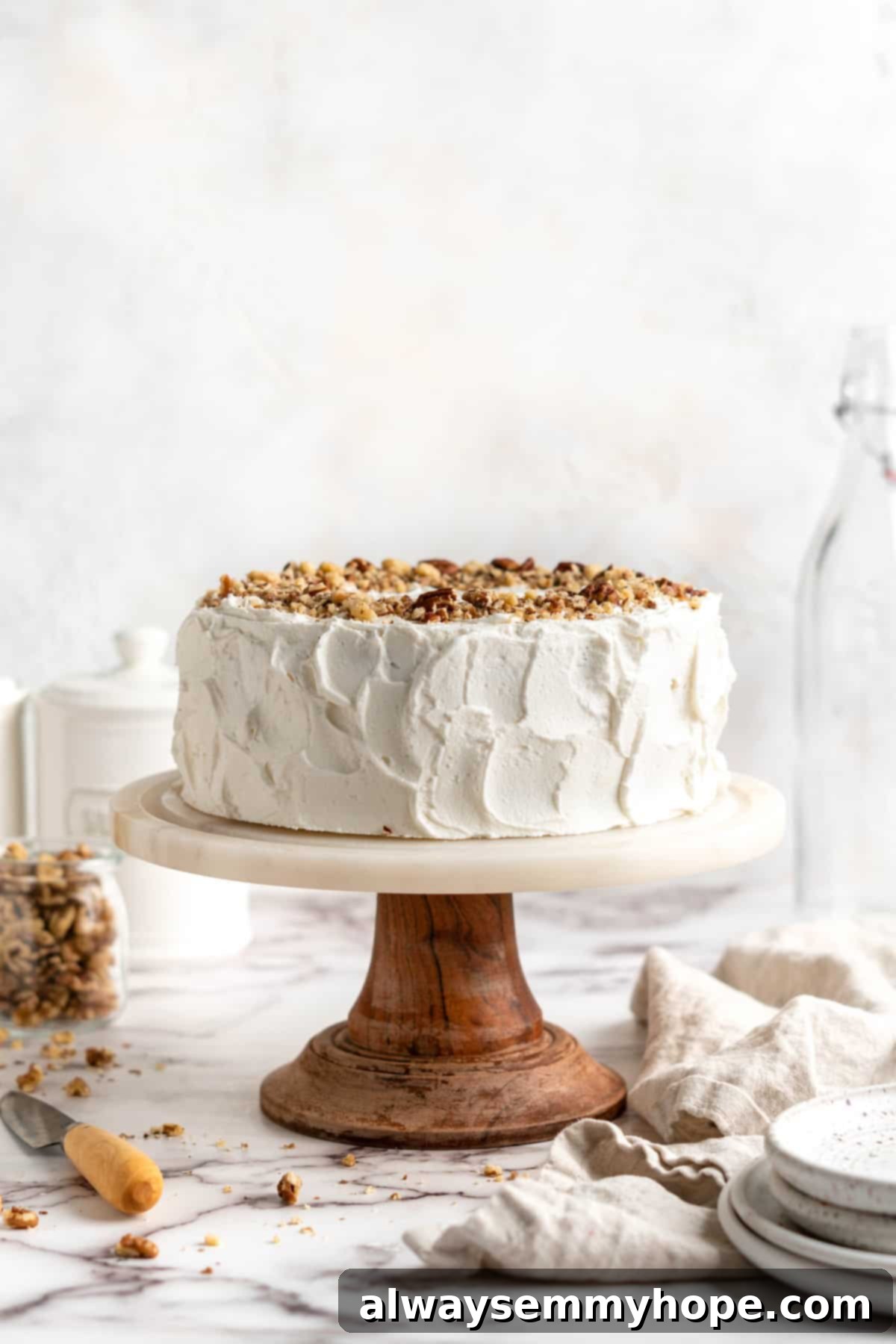 Decadent Plant-Based Carrot Cake 5 Vegan carrot cake on cake stand