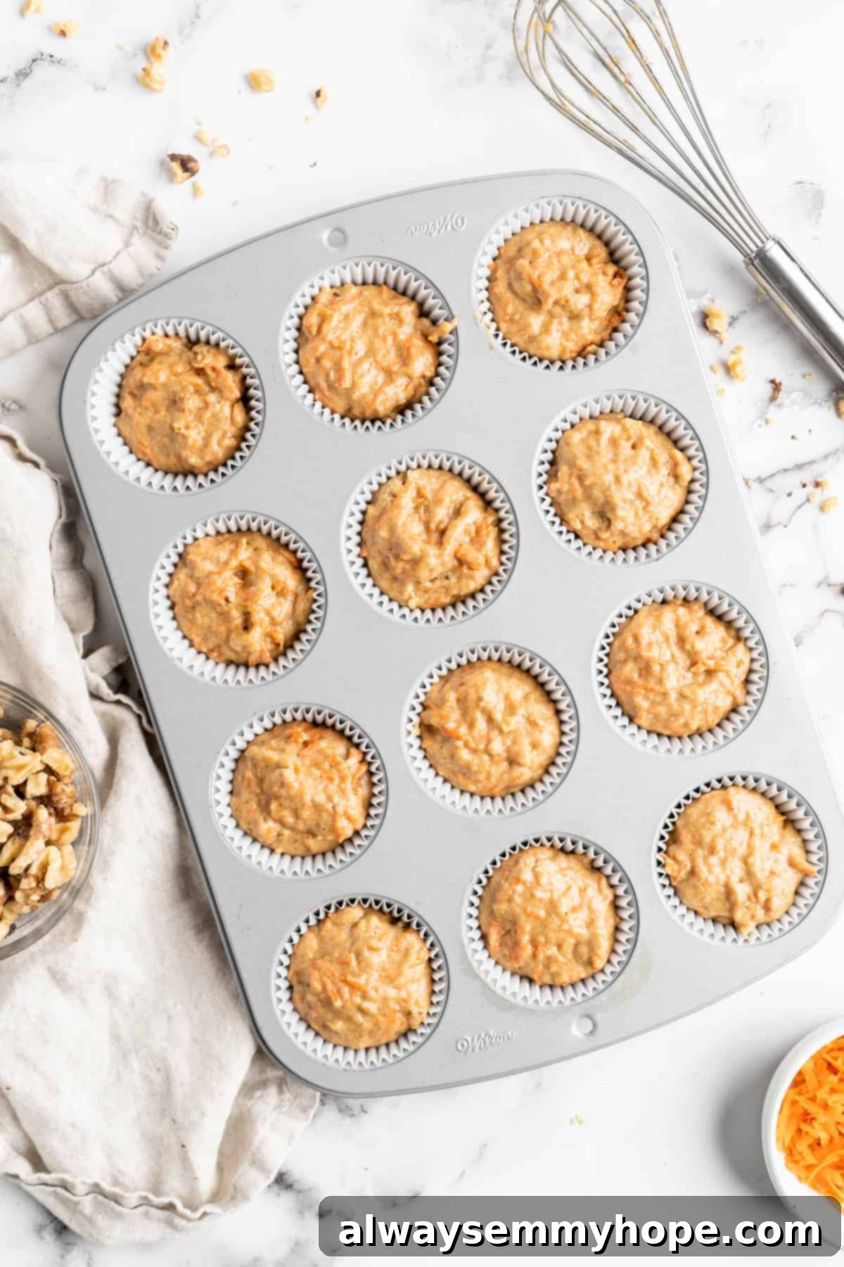 Carrot cake batter in cupcake pan