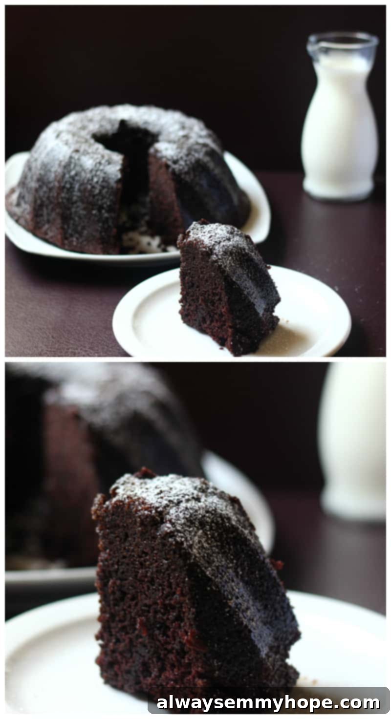 A beautifully presented whole Guinness Chocolate Cake on a white plate, ready for serving, showcasing its elegant bundt shape and a light dusting of powdered sugar.