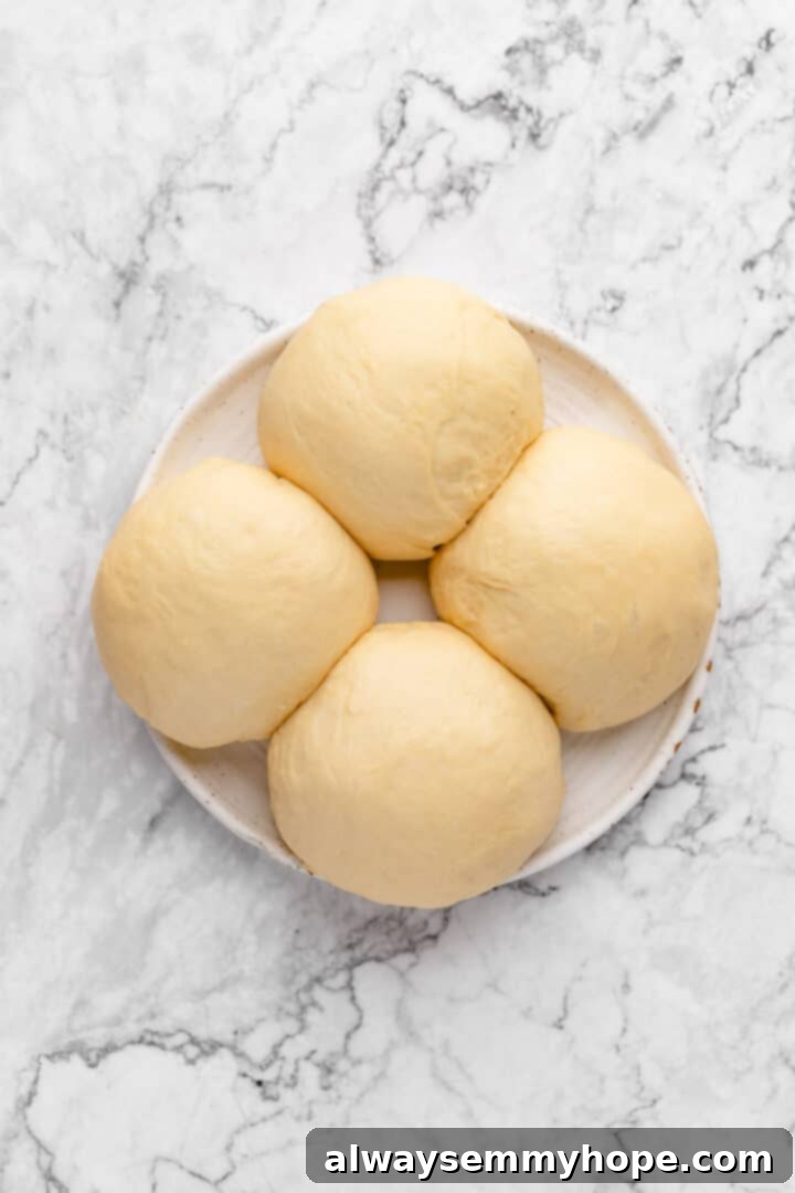 Fluffy Vegan Japanese Milk Bread 17 Four balls of bread dough