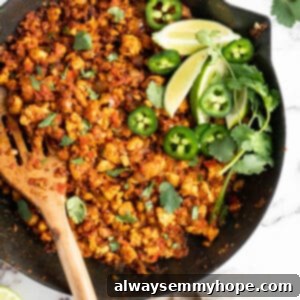 Homemade Chipotle Sofritas 12 Cast iron skillet of sofritas with wooden spoon and garnishes