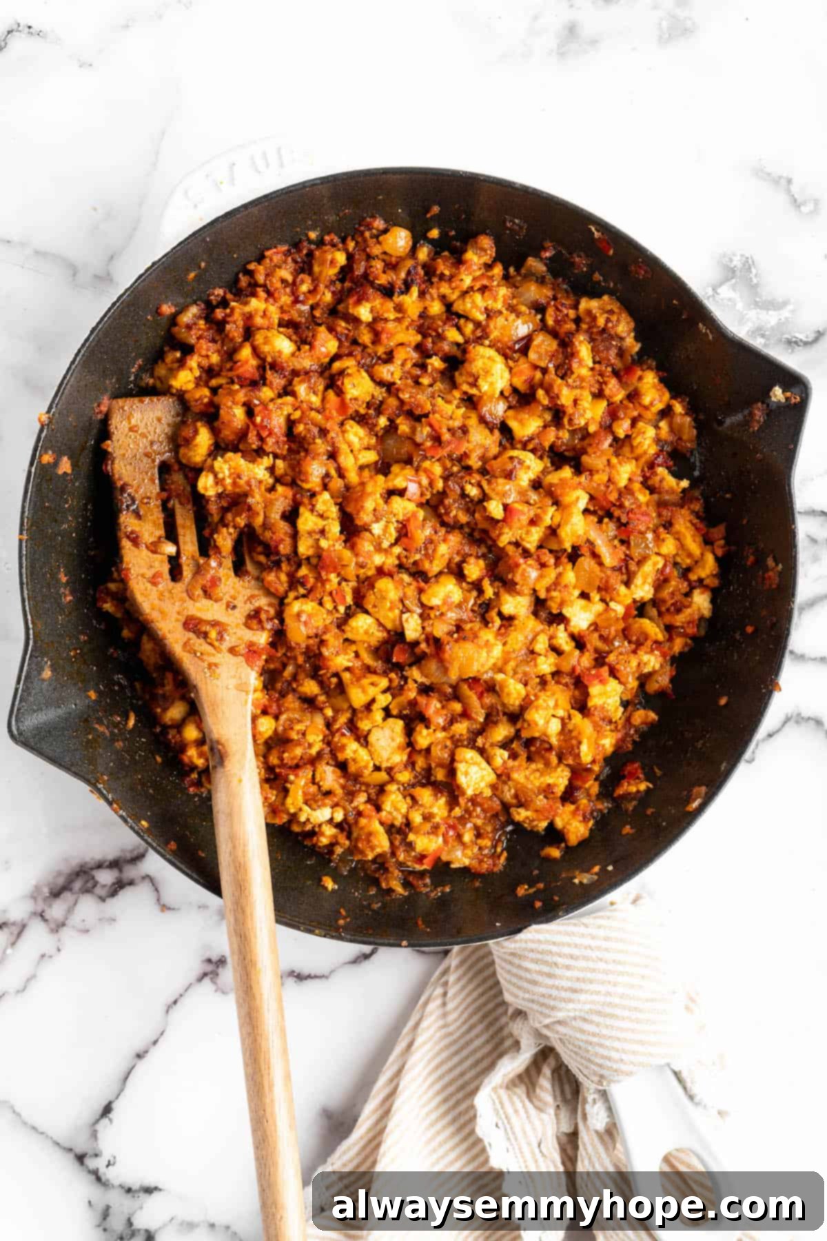 Homemade Chipotle Sofritas 9 Overhead view of finished vegan sofritas in a cast iron skillet, ready to be served