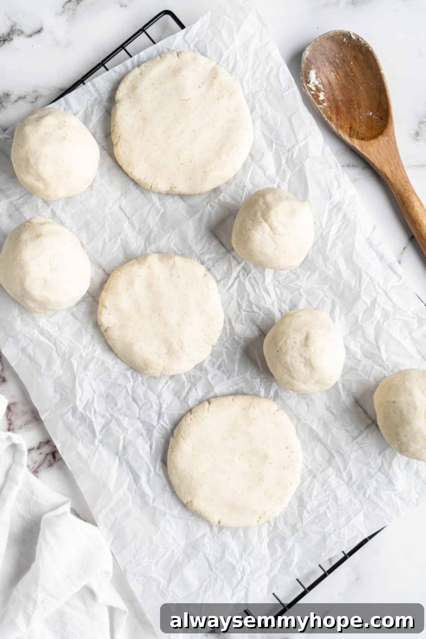 This step-by-step tutorial will show you how to make perfect vegan arepas with just a few ingredients. They're easier to make than you think! Close-up view of hydrated vegan arepa dough resting in a bowl, showing its smooth, consistent texture before shaping.