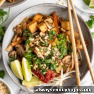 Overhead view of vegan Pad Thai with chopsticks