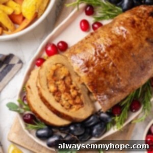 Festive Plant-Based Roast 2 Vegan turkey on platter with one slice cut to show stuffing inside