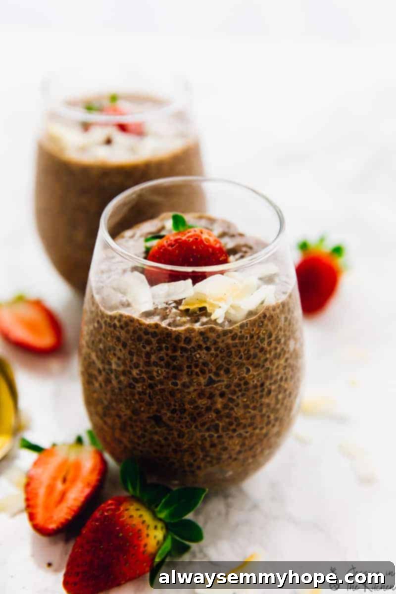 A wine glass filled with chocolate chia pudding.
