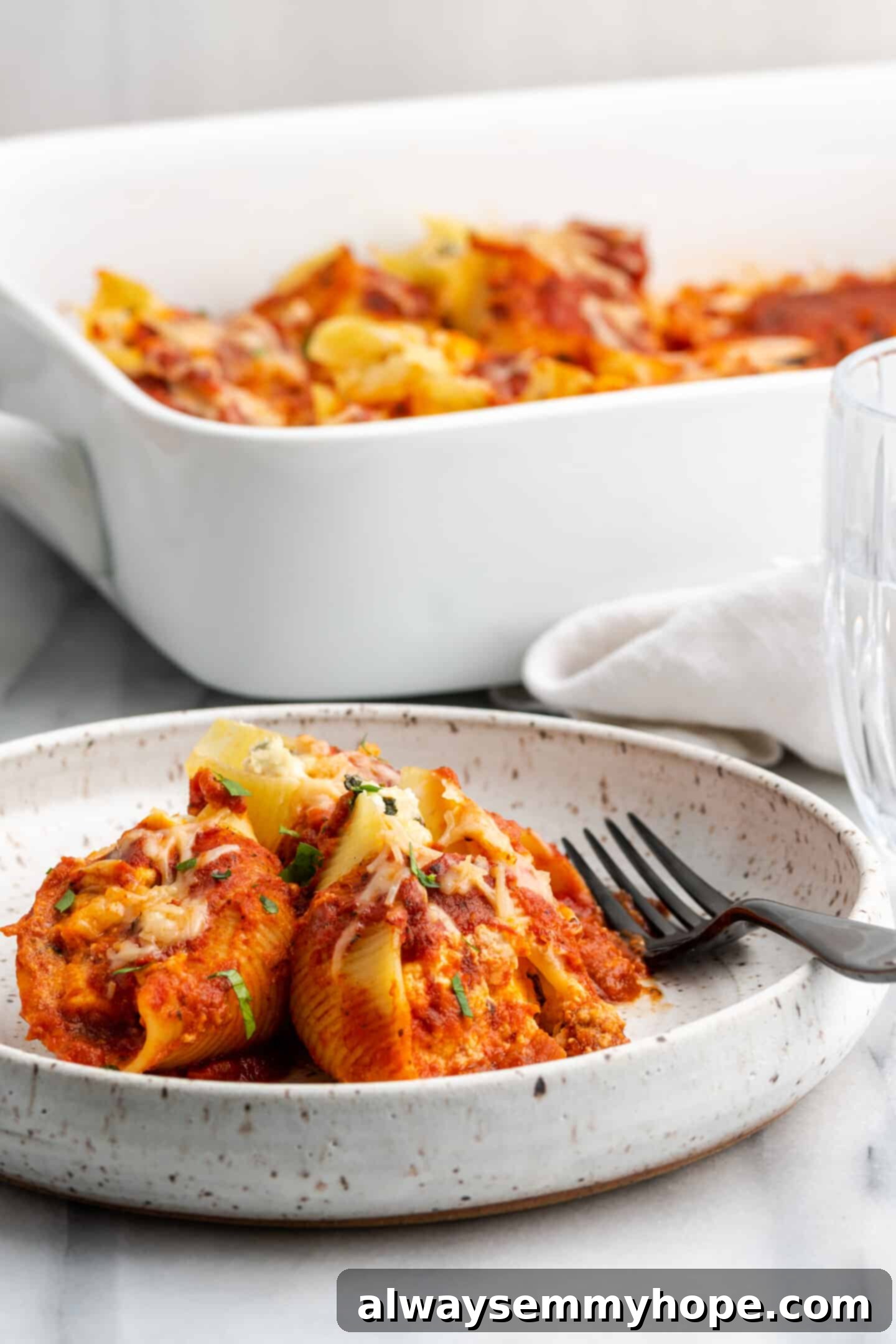 Creamy Vegan Stuffed Shells 2 Single serving of vegan stuffed shells, perfectly baked and garnished