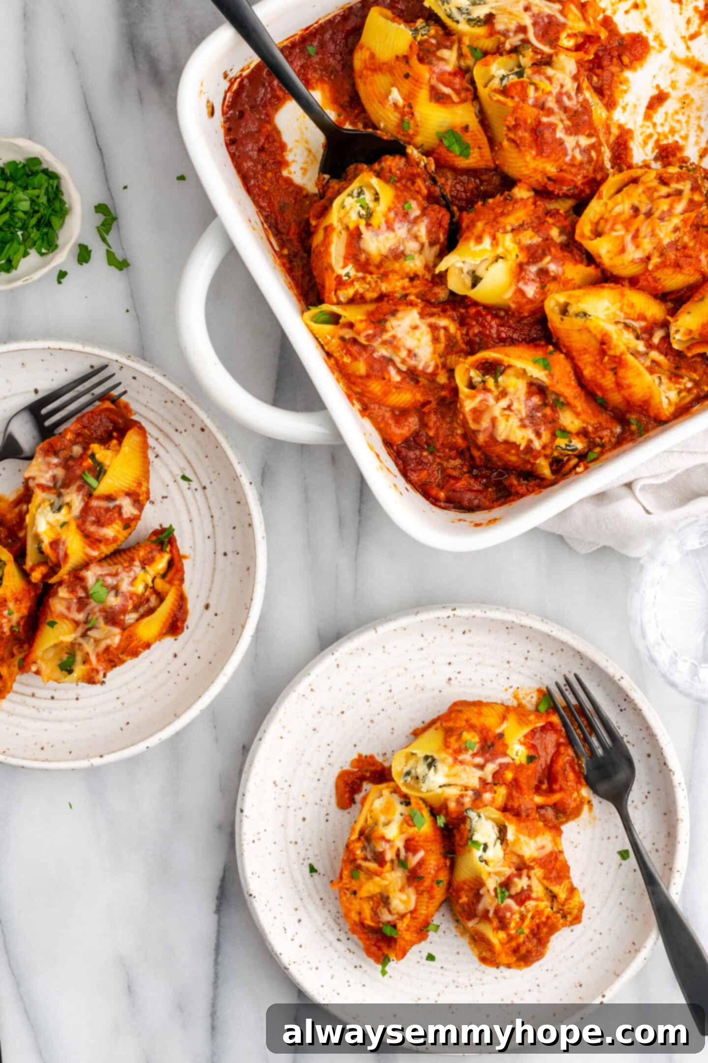 Creamy Vegan Stuffed Shells 16 Family-style serving of baked vegan stuffed shells, ready to be dished out