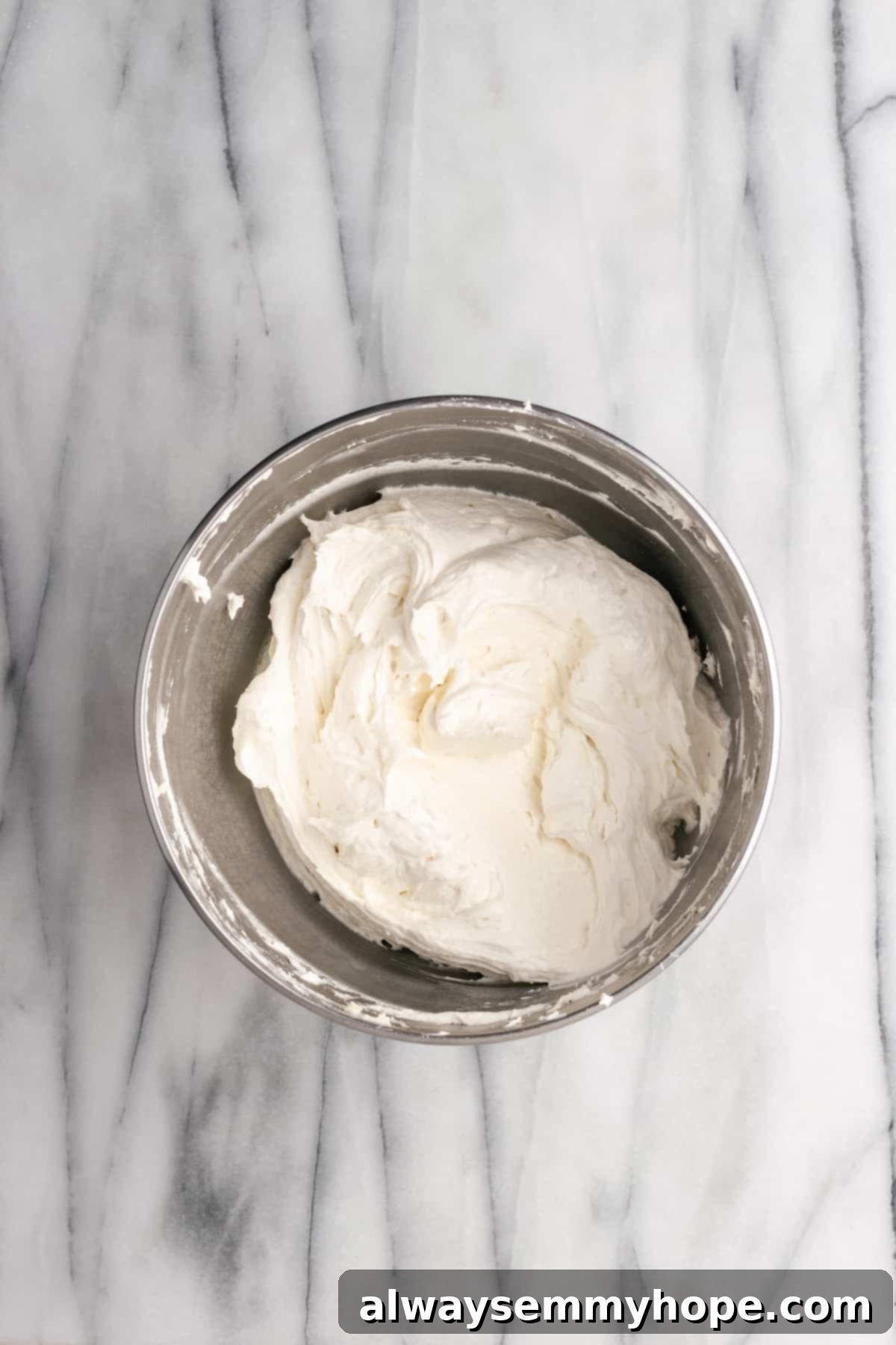 Tropical Vegan Coconut Cake 14 The vegan cream cheese frosting nearing its perfect fluffy and spreadable consistency.