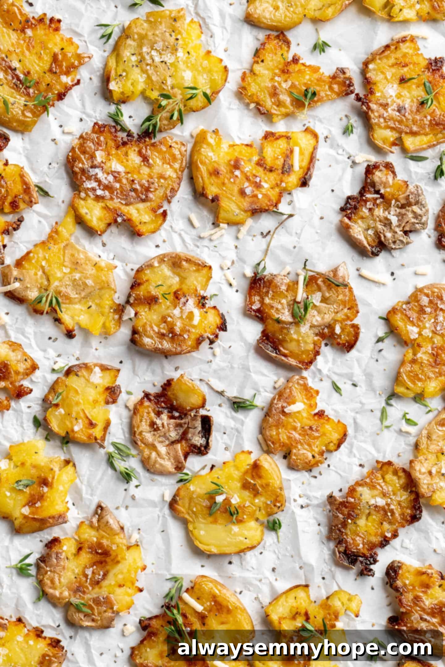 Crispy smashed potatoes on a sheet pan, golden and perfectly baked