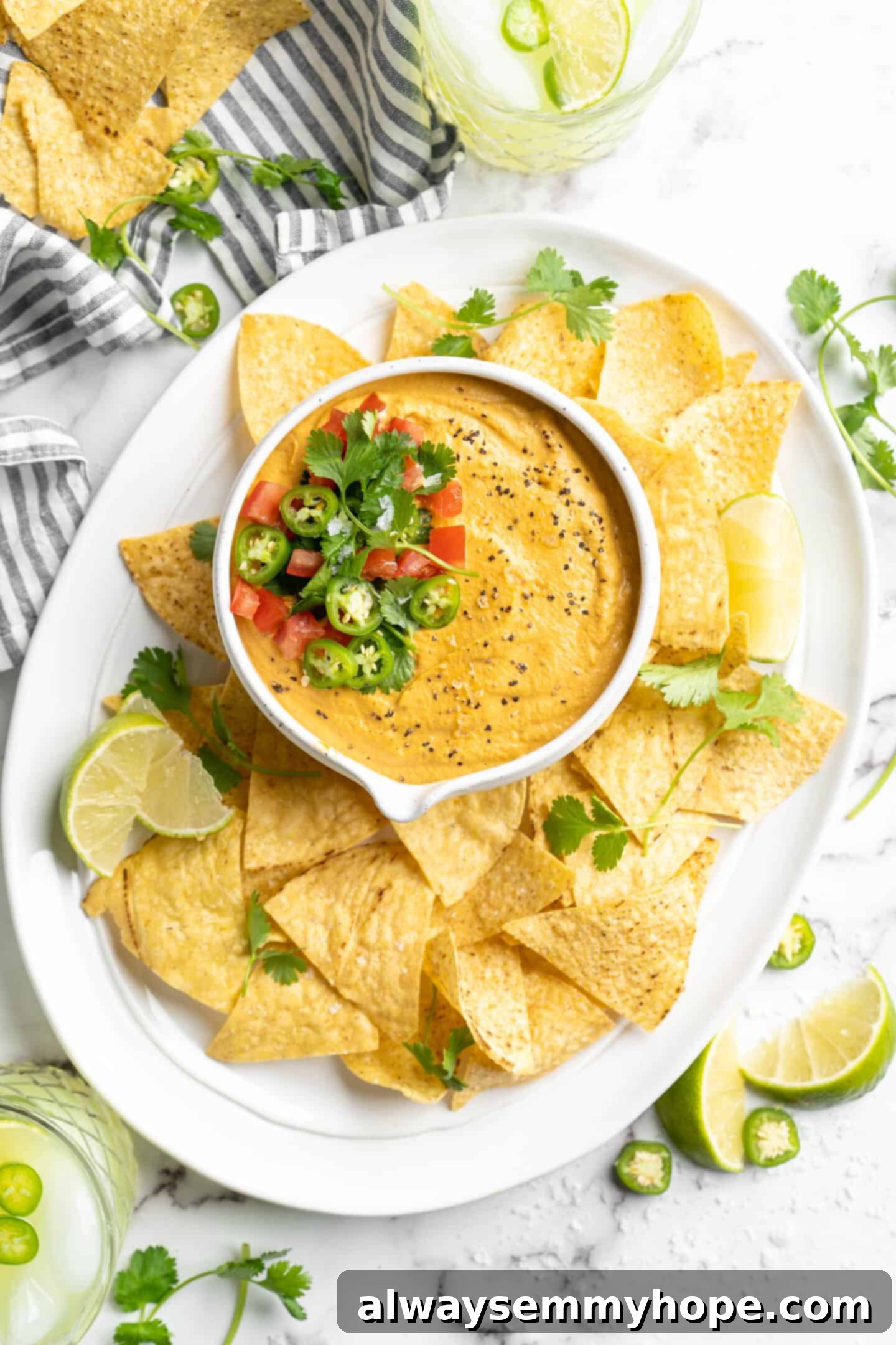Vegan queso with tortilla chips Vegan queso with tortilla chips