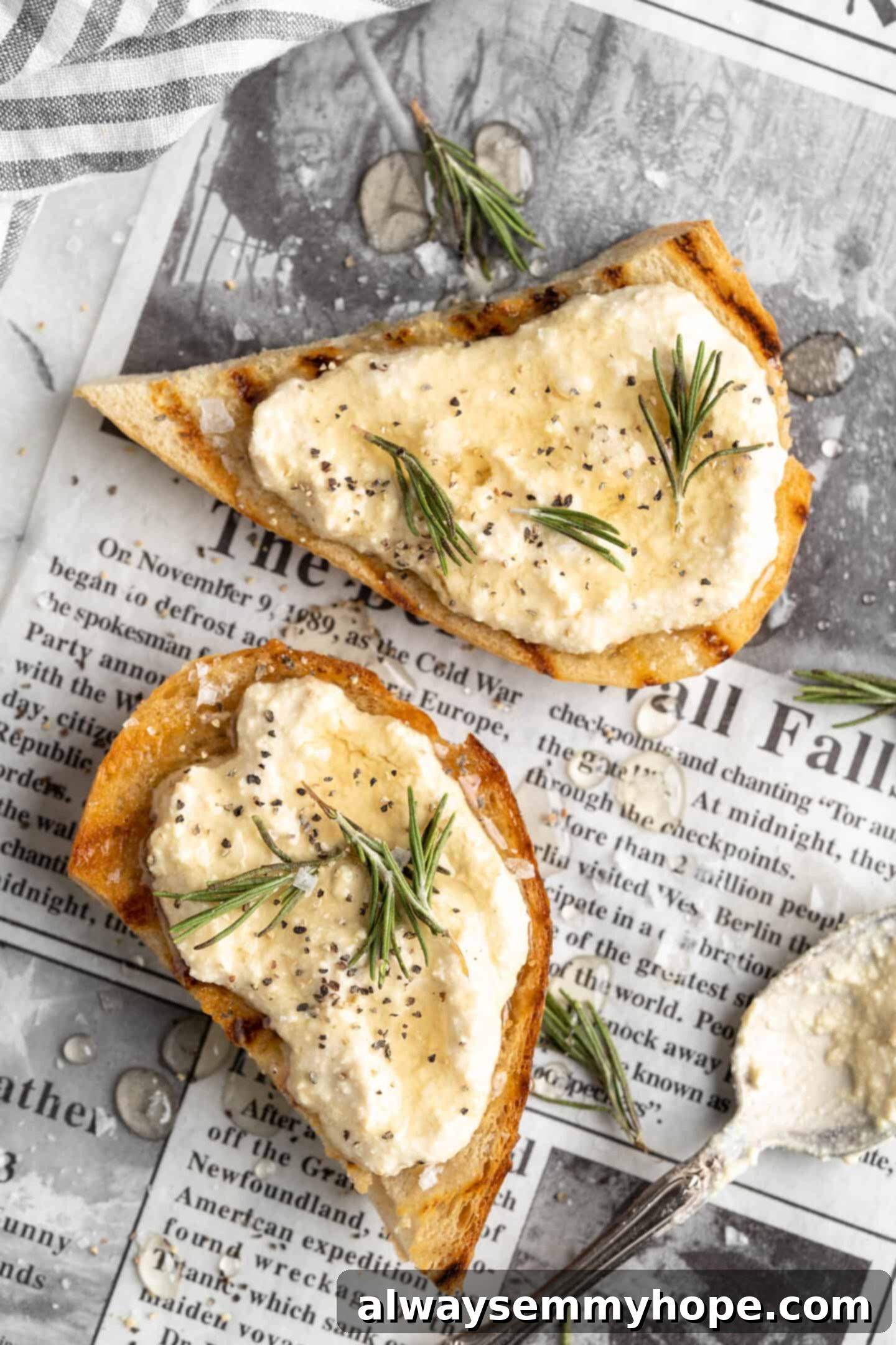 Enjoying creamy vegan ricotta on perfectly toasted bread. Vegan ricotta spread on toast, ready to eat.