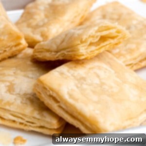 Close up of squares of baked puff pastre