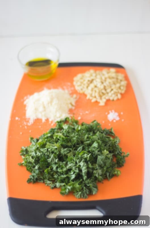 Ingredients for pest on a chopping board.