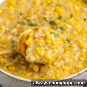 Spoonful of vegan creamed corn in bowl