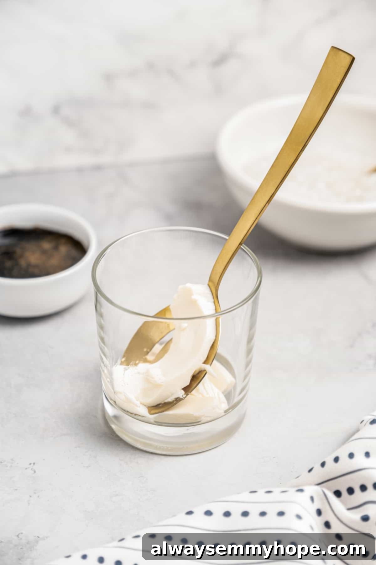Spoonful of silken tofu in glass