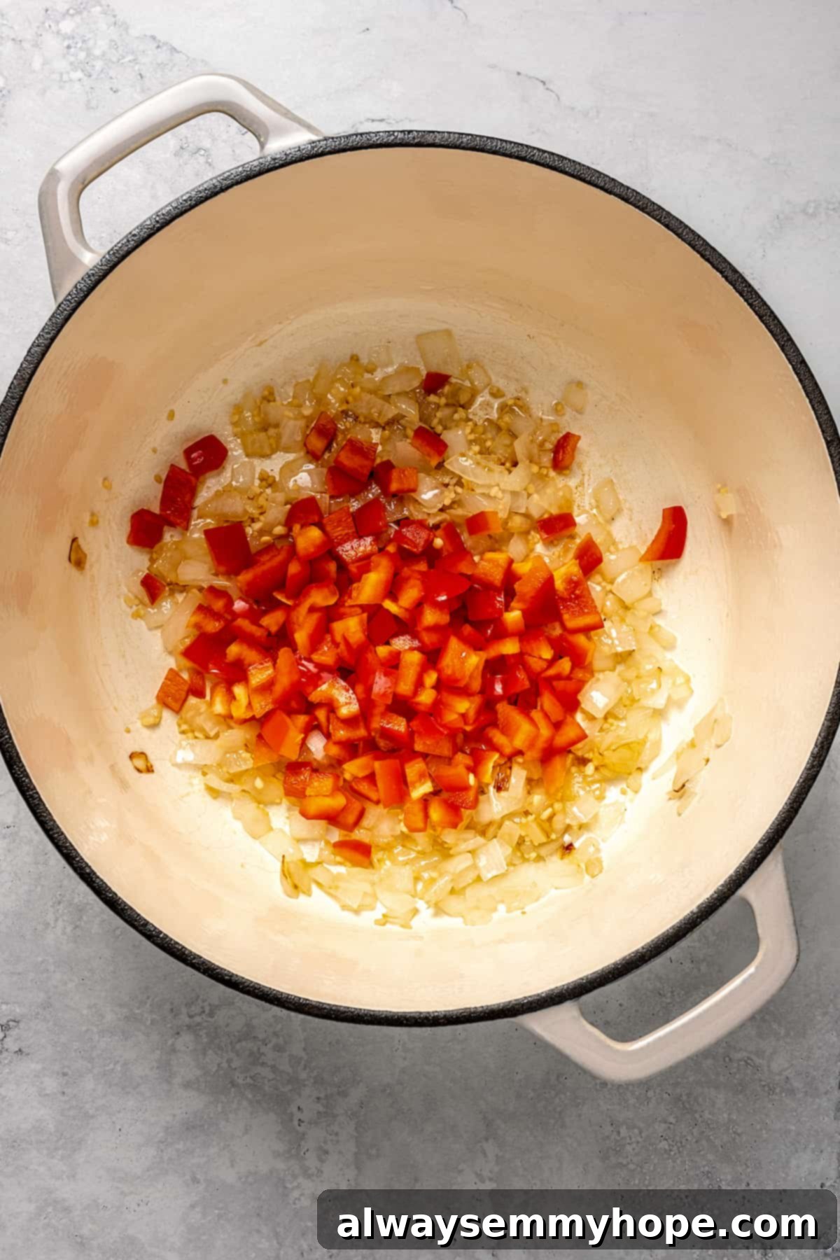 Adding red bell peppers to pot