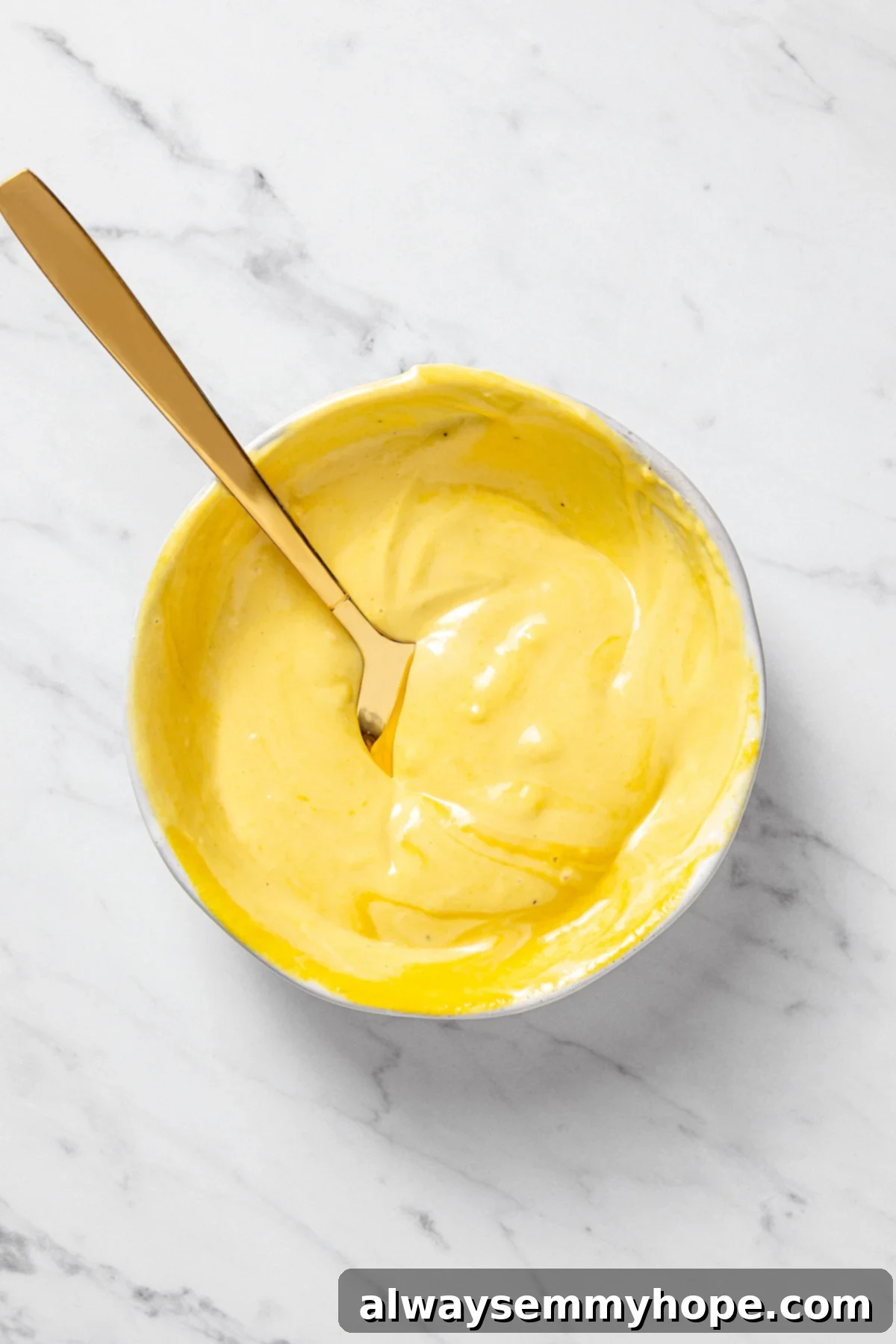 The air fryer makes these shoestring fries perfectly crispy without all the oil, and my blend of savoury seasonings makes them irresistible! Overhead view of dipping sauce for fries